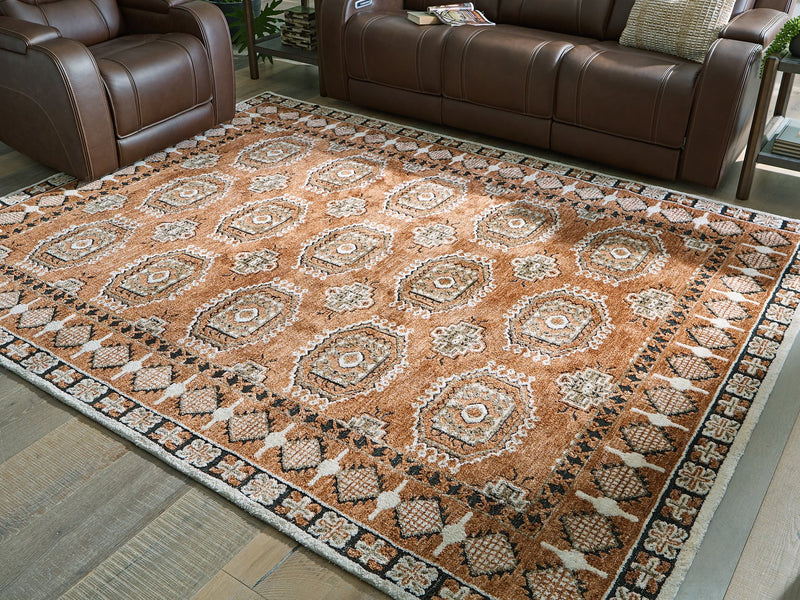 Qaabiz Area Rug